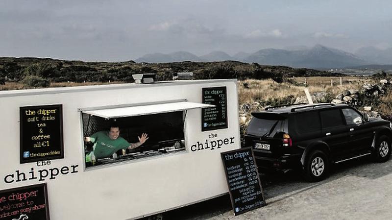 Mark Furniss inside his chipper at Clifden Mart.