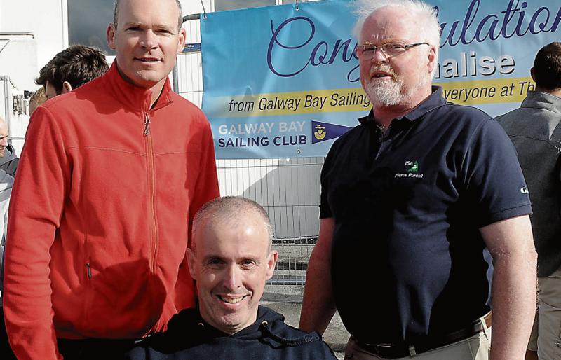 Commodore Gary Allen (centre) with Minister for House, Planning and Local Government Simon Coveney, who was competing in Galway last weekend, and Director of the Irish Sailing Association, Pierce Purcell at the National Laser Racing Championships, at Galway Bay Sailing Club, Renville, Oranmore.