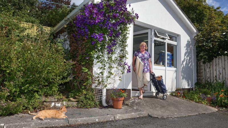 Geraldine Folan leaving her studio to go painting on the Salthill Promenade. Photo: Joe O'Shaughnessy.