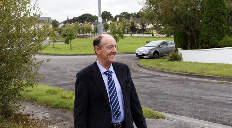 Cllr Michael Finnerty standing at the sites in Garbally Drive. Photo: Gerry Stronge.