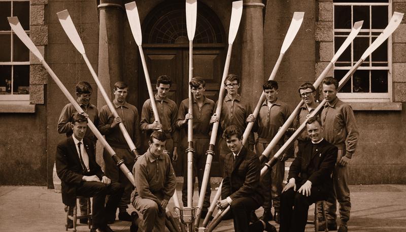 The St Joseph’s College ‘Bish’ rowing crew pictured outside the old school building, after winning the Gogarty Cup – presented by Oliver St John Gogarty for senior schoolboy eights at the Galway Regatta in 1966, exactly 50 years ago. Back, from left: Frank Mulligan, Dermot O’Neill (captain), Sean Coll, Tony Forde, Michael Brennan, Conor Lally, Sean Moynihan and Martin Fahy (Stroke). Front: Kieran Burke RIP, Aidan O’Shea (Cox), Michael Kavanagh (coach) and Brother Fidelis RIP. The Bish defeated the crew from the Jes, which was captained by the now-Senator Billy Lawless.