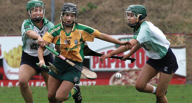 Mullagh's Aoife Donohue is challenged by Sarsfields Tara Kenny and Laura Ward during Sunday's Galway senior camogie final at Kenny Park, Athenry. Photos: Joe O'Shaughnessy.