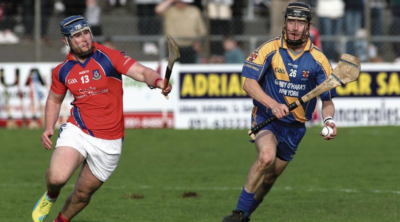 Loughrea's Neil Keary is chased by St Thomas' Bernard Burke during Sunday's county senior semi-final at Kenny Park, Athenry. Photos: Joe O'Shaughnessy.