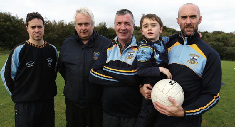 The Salthill/Knocknacarra senior football mentors who will be trying to plot Corofin's downfall in Sunday's County Final at Pearse Stadium, from left: Declan Burke, trainer, Tom Kelly, Val Daly, manager, and Sean O'Dowd with his son Jack.