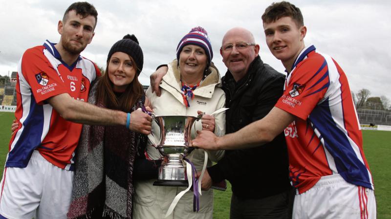 The Mannion family with the Mick Sylver Cup after Ahascragh/Fohenagh's intermediate hurling championship final triumph over Ballinderreen at Kenny Park last Sunday. From left: Padraic Sinead, Marie, Tom and Cathal Mannion.