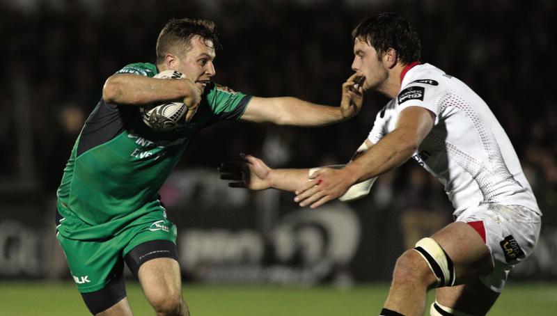 Connacht out half Jack Carty hands off Ulster's Iain Henderson during Friday night's Guinness Pro12 encounter at the Sportsground. Photo: Joe O'Shaughnessy.