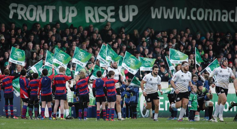 Connacht captain John Muldoon and mascot Joshua Towey pose for a photograph as the teams run on to the pitch before the start of the European Rugby Champions Cup game against Zebre at the Sportsground. Photo: Joe O'Shaughnessy.