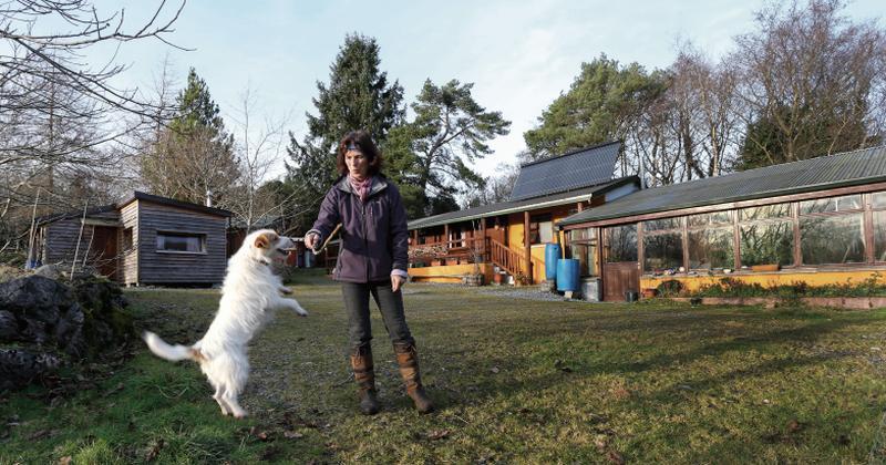 Marion Edler from Crann Óg Eco Farm in South Galway with her dog Minnie. Nature Therapy is "about the pleasurable experiences around nature, sustaining us and opening us up to the healing power of nature,” she says. Photo: Joe O'Shaughnessy.