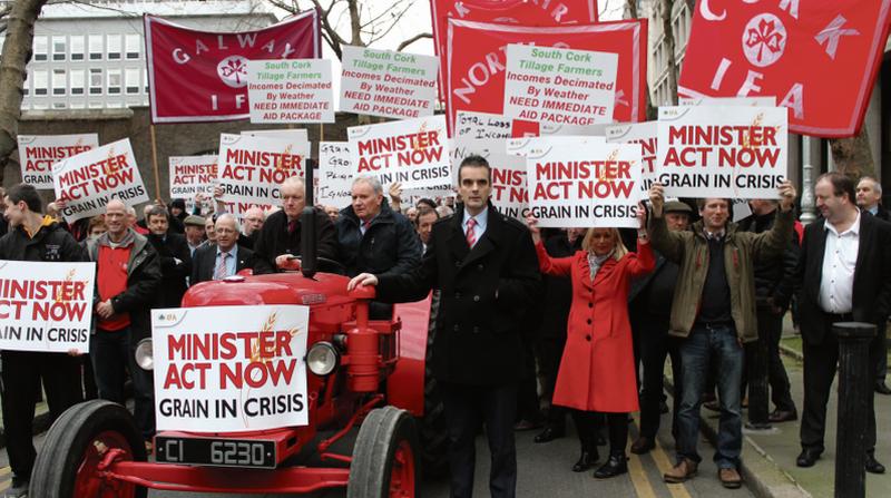 Powerful vintage: IFA President, Joe Healy, beside a David Brown 30D at the IFA protest outside the Dáil last week seeking aid for grain growers whose crops were decimated by the bad weather of last September.