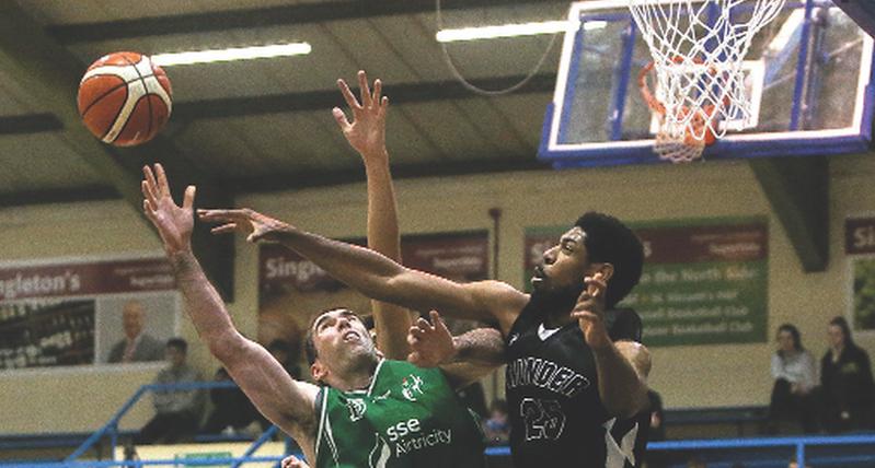 SSE Airtricity Moycullen's Paul Freeman tussling with Justin Goldsborough of Griffith Swords Thunder during Saturday's National Basketball Cup semi-final at the Neptune Stadium, Cork. Photo: Gary Carr/Inpho.