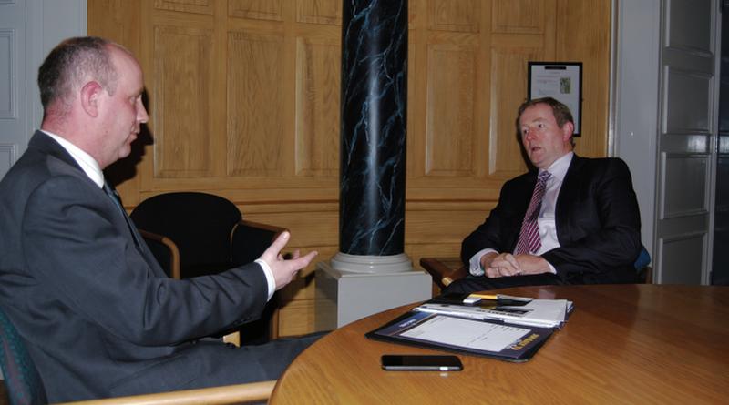 Across the benches...Taoiseach Enda Kenny chats with Jim Daly, one of that rarest of breeds - a Fine Gael backbencher.