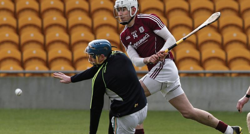 Galway full forward Jason Flynn sends the sliotar past Offaly goalkeeper James Dempsey for his team's opening goal in Sunday's National League tie at O'Connor Park. Photo: Joe O'Shaughnessy.