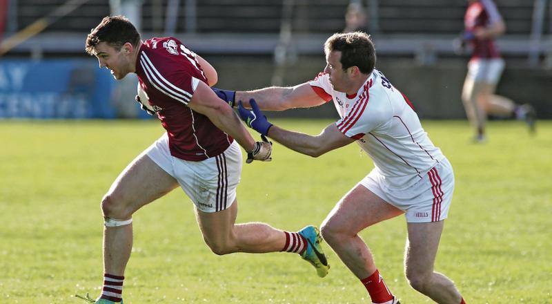 Galway attacker Damien Comer tries to break free from Cork's James Loughrey during Sunday's National League tie at Pearse Stadium.