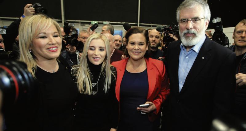 Triumphant....Sinn Fein top brass Michelle O'Neill, Mary Lou McDonald and Gerry Adams with the party's new MLA for West Belfast Órlaithí Flynn.