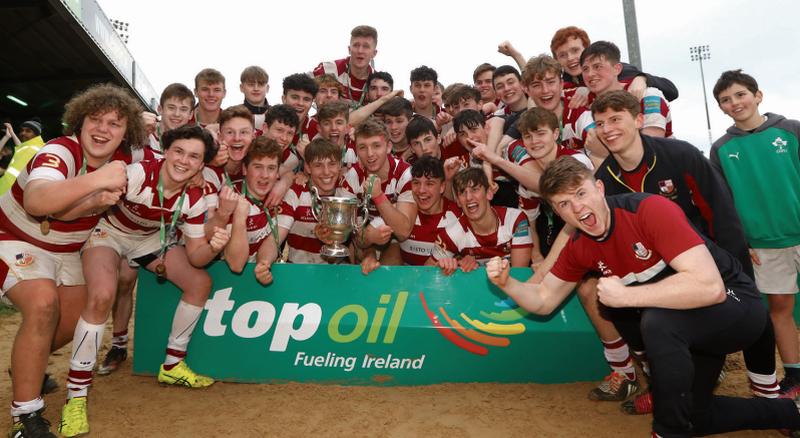 The Coláiste Iognáid side celebrate after retaining the Connacht Senior Schools' Cup in the Sportsground on Wednesday. Photos: INPHO/James Crombie.