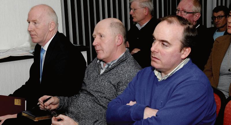 Noel Larkin and Michael Crowe appear less than thrilled with this seating arrangement.