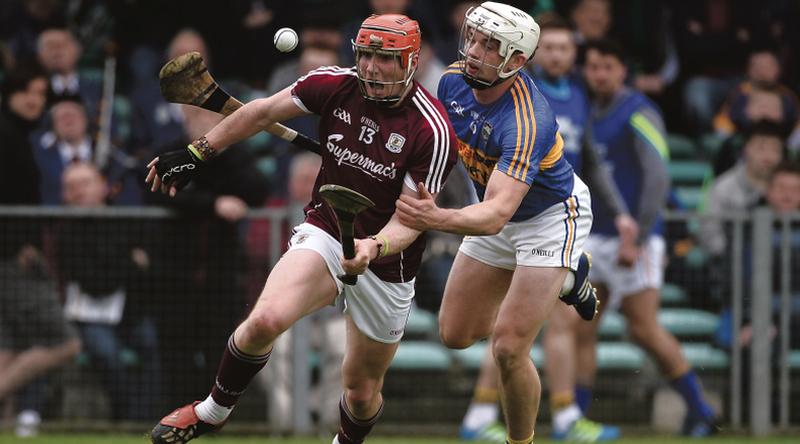 Galway's Conor Whelan comes under pressure from Tipperary's Ronan Maher during Sunday's National League Final at the Gaelic Grounds. Photo: Diarmuid Greene/Sportsfile.