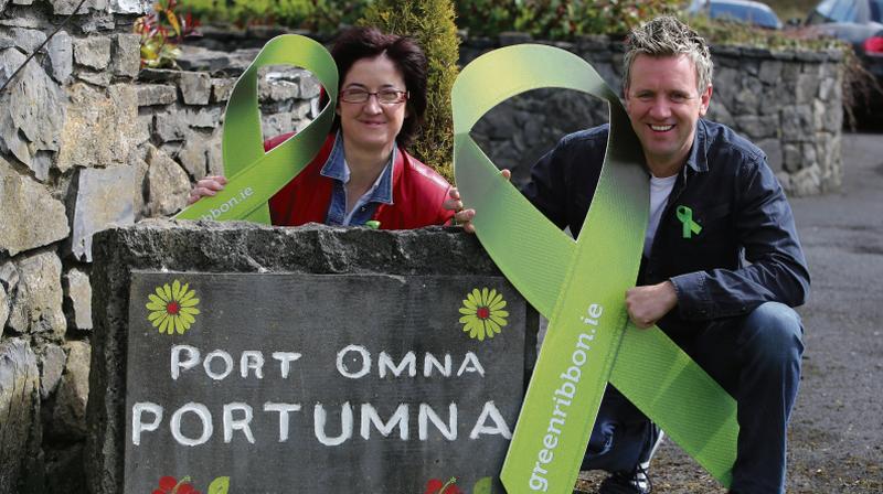 Organiser Maura Canning and Irish country music legend Mike Denver launching the annual IFA Green Ribbon Walk and Talk mental health awareness event that will be held at the Portumna Forest Park on Sunday next, May 7, starting at 3pm.