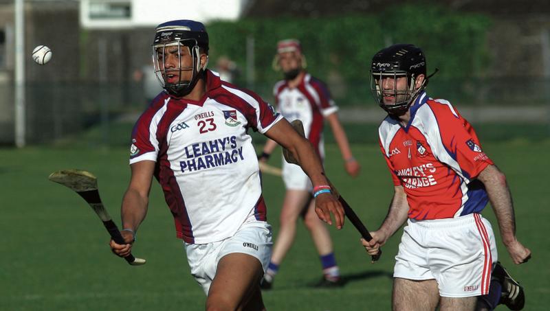 Kilnadeema-Letrim's Dylan Towolwai races away from Ahascragh-Fohenagh's Paul Gavin in Duggan Park on Sunday. Photo: Enda Noone.