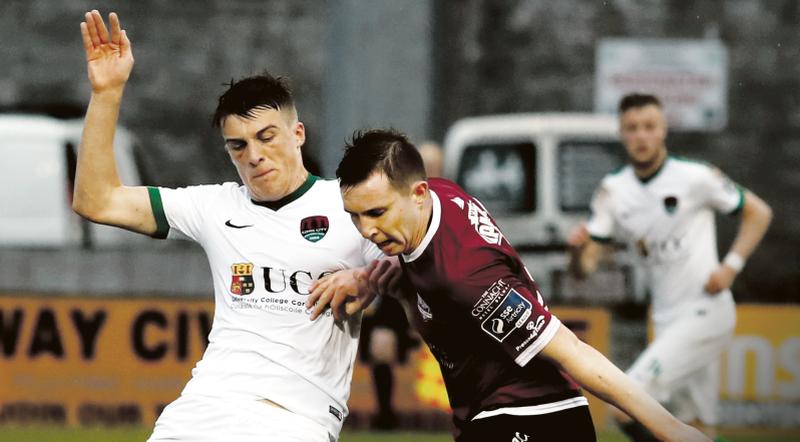 Galway United's Paraic Cunningham tussling for possession with Cork City's Ryan Delaney in Friday night's Premier League tie at Deacy Park on Friday. Photo: Kennedy/Eirefoto.