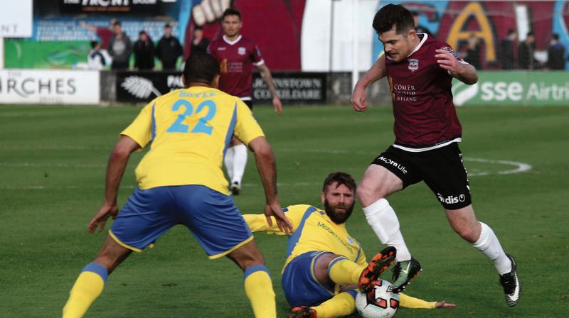 Galway United's Ronan Murray takes on Finn Harps' Patrick McCourt and Ethan Boyle during Friday night's Premier Division tie at Eamonn Deacy Park. Photo: Joe O'Shaughnessy.