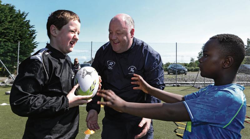 Derek Niland (centre) coaching during the weekly Saturday morning session at Corinthians RFC.