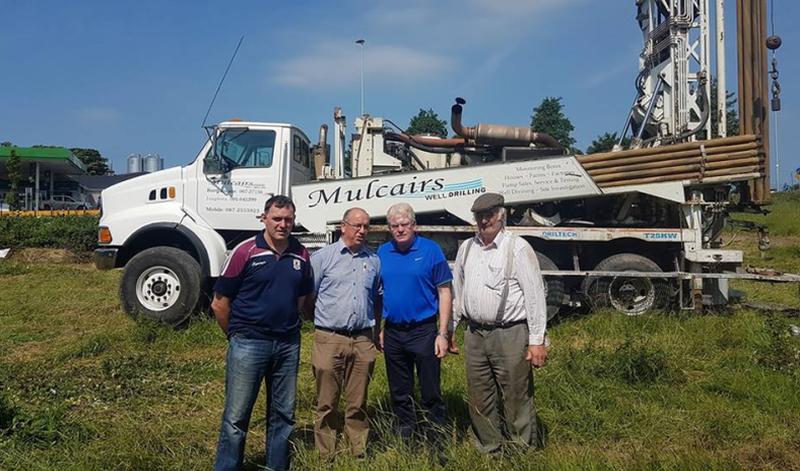 IF it works out, then it could be the simplest solution of all. Just find a hole in the ground in the right place and let the floodwaters soak away into the earth. Labane businessman, Pat Quinn and farmer/contractor, PJ Mahoney, are behind an exploratory project aimed at finding out if dry underground chambers in local flood areas could be tapped into to take away the water. The project – grant aided by the OPW (Office of Public Works) – involved the drilling of three trial holes last week in an acute flood pinch point at Labane, opposite the local filling station. Well drilling specialists, Mulcairs of Loughrea and Borrisokane, drilled three holes approximately 40 feet in depth at the site and while two of them didn’t locate any ‘vacancy’, a third one indicated the possibility of an empty chamber. The next step is pour approximately 6,000 gallons of water into this third borehole with the aim of trying to ascertain if it has the capacity to absorb larger amounts of water. If that works, then at a later stage, tracers could be put in the water to find out where it eventually ends up. The project has also involved the use of water diviners over more recent times and during the critical flood period of late 2015 and early 2016. Pat Quinn explained to the Farming Tribune that the work was essentially exploratory but was based on the possibility of ‘dry chambers’ being tapped into in some of the key flood areas. They are also anxious to find out why an under-road pipe put in place during the last bad floods had an outflow into a field that soaked away all the water. For more, read this week’s Connacht Tribune.