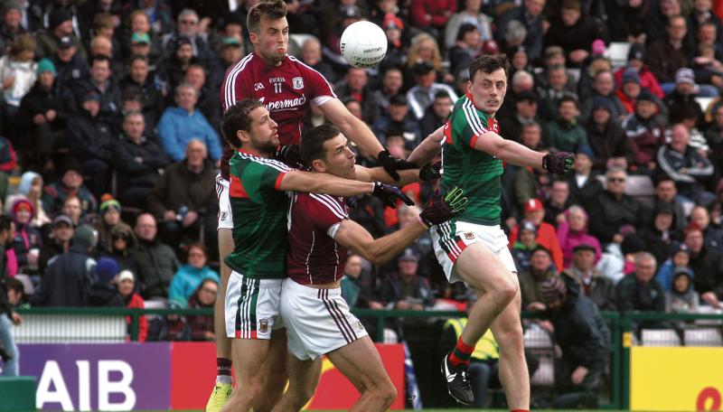 Galway’s Paul Conroy and Fiontan O Curraoin battle for midfield possession with Mayo's Tom Parsons and Diarmuid O'Connor in Sunday's Connacht semi-final. Photo: Enda Noone.