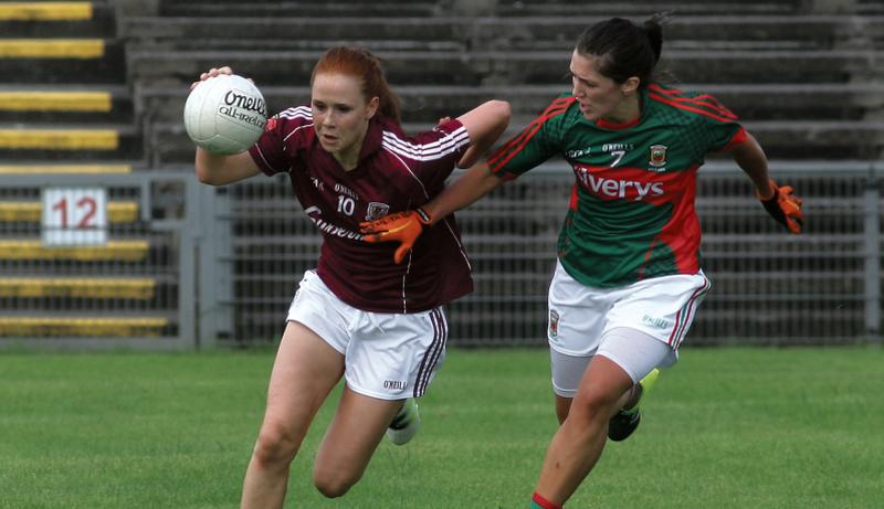 Galway attacker Olivia Divilly on the ball against Mayo's Orla Conlon during last year's Connacht ladies senior football final at McHale Park, Castlebar.