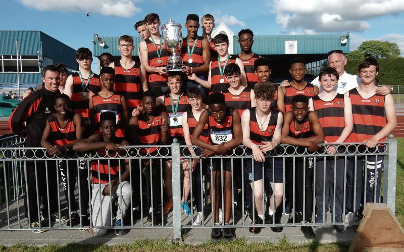 The St Mary’s College squad with coaches Gerard Lennon and Anthony Carey after being presented with the College of Science Cup.