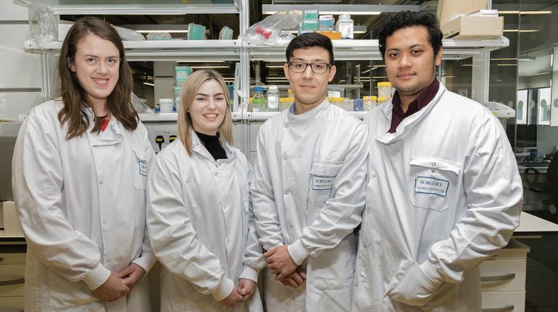 Summer students (from left) Eimer O’Connell; Niamh Lang, David Miresse; Wan Mohamad Firdaus Wan Kamarudin at the Lambe Institute for Translational Research, NUI Galway funded by Breast Cancer Research.