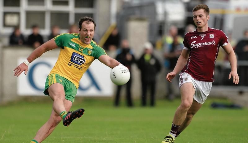 Galway defender Liam Silke can't prevent Donegal's Michael Murphy from setting up an attack during Saturday evening's All-Ireland football qualifier at Markievicz Park.