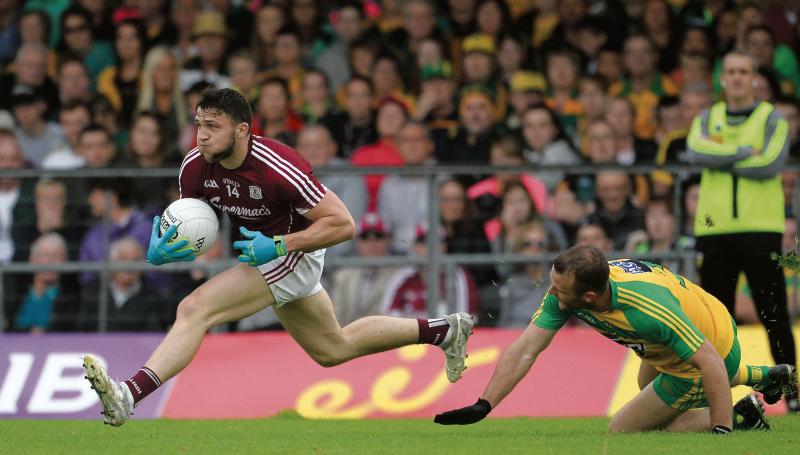 Galway's Damien Comer leaves Donegal's Neil McGee trailing in his wake during the All-Ireland football qualifier at Markievicz Park on Saturday. Photo: Oliver McVeigh/Sportsfile.