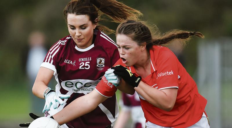 Galway's Ailish Morrissey tussling for possession with Cork's Áine Keating during the All Ireland Ladies Football Under 6 A Final in Nenagh last Wednesday. Photos: Seb Daly/Sportsfile .