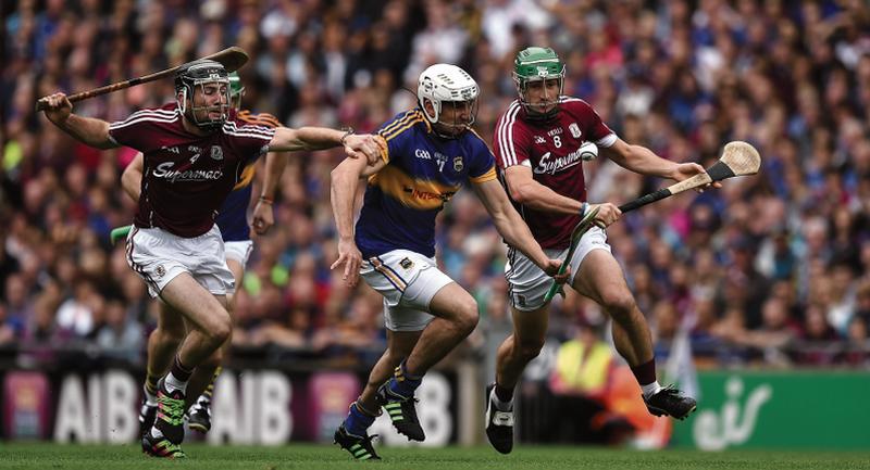 Galway's Padraic Mannion and David Burke give chase to Tipperary's Patrick 'Bonner' Maher during last year's All-Ireland hurling semi-final at Croke Park.