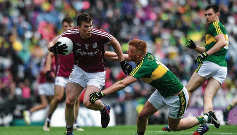 Galway defender Gareth Bradshaw is tackled by Johnny Buckley of Kerry during Sunday's All-Ireland football quarter-final at Croke Park. Photo: Ramsey Cardy, Sportsfile