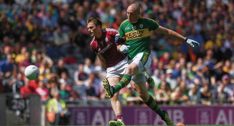 Key moment: Kerry's Kieran Donaghy scores the only goal of Sunday's All-Ireland football quarter-final as Galway's Liam Silke gives vain chase at Croke Park. Photo: Ramsey Cardy Sportsfile.