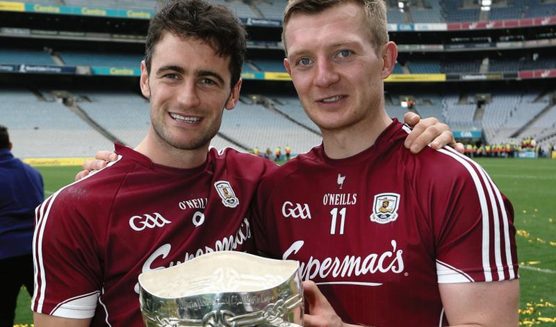 Galway captain David Burke and Joe Canning with the Liam McCarthy Cup after defeating Waterford in Sunday's All-Ireland hurling final at Croke Park.