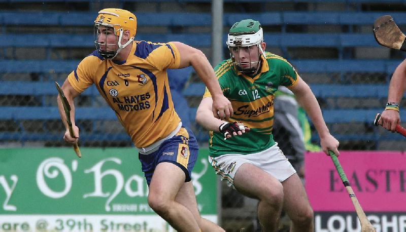 Portumna defender Martin Dolphin breaking away from Gort's Aiden Helebert during Saturday's senior hurling championship clash in Loughrea. Photos: Joe O'Shaughnessy.