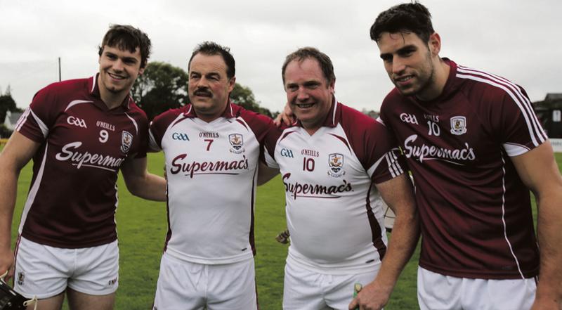 Galway's eighties heroes, Gerry McInerney and Joe Cooney, with their sons and 2017 All-Ireland medal winners, Joseph and Gearóid, before the Tony Keady Memorial fund-raising challenge at Kenny Park last Thursday. Photo: Hany Marzouk.