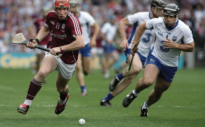 Galway attacker Conor Whelan in a race for possession with Waterford's Noel Connors during Sunday's All-Ireland senior hurling final at Croke Park. Photos: Joe O'Shaughnessy.