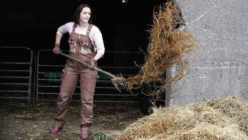 The great outdoors: Grace Roche models a selection of her gear for women at work on the farm who want to be practical and stylish, all in the one go. Dungarees, rain jackets, gilets, trousers, wellies and boots are all featured. PHOTOs: HANY MARZOUK.