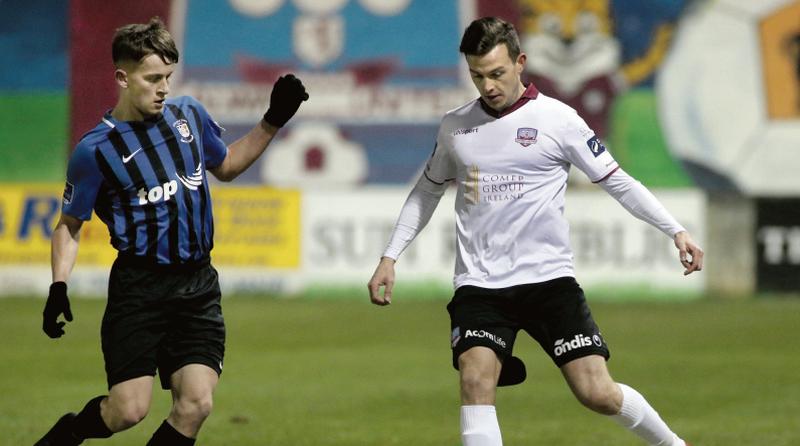 Galway United's Marc Ludden on the ball against Taigh Keogh of Athlone Town during Friday night's First Division tie at Eamonn Deacy Park. Photo: Joe O'Shaughnessy.