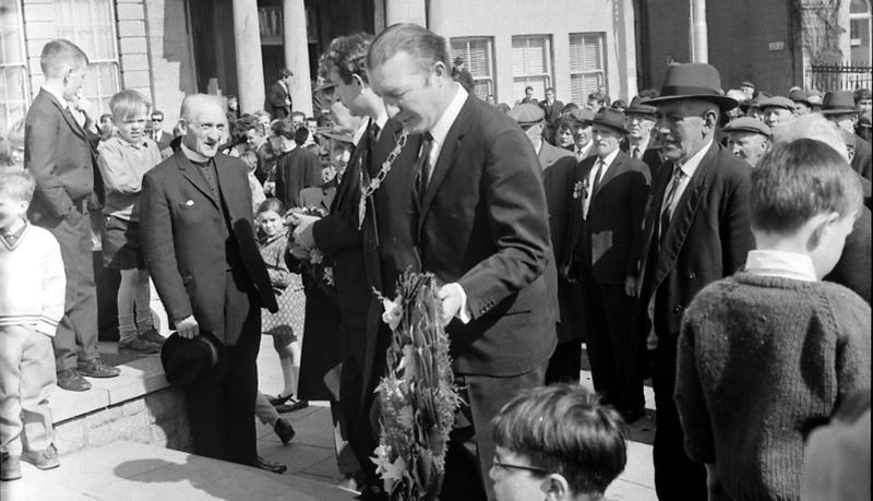 Charles Haughey, Minister for Finance, lays a wreath at the statue of Liam Mellowes in Eyre Square in Galway in Easter 1969, watched by an attendance including members of the Old IRA who served with Liam Mellowes during the 1916 Rising.