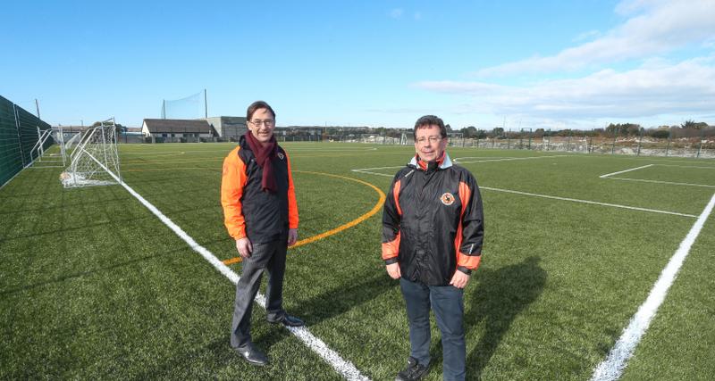 Niall Rooney and Noel O'Toole at the Bearna na Forbacha Aontaithe new all weather pitch in Furbo. The club is also aiming to build a full size international grass pitch in the coming years.