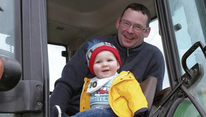 Christy Lally from Kilbeacanty with his 8-months-old son Thomas taking part at the Kilbeacanty charity tractor run and family friendly day out to support mental health awareness, Photo: Hany Marzouk.