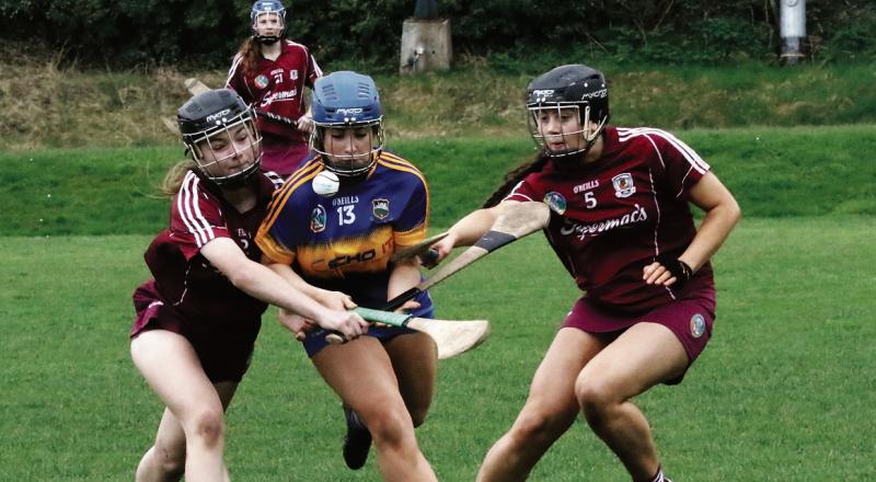 Galway’s Kate Moran (left) and Pearl Finnerty try to put the shackles on Tipperary’s Emma Flanagan during Saturday's All-Ireland minor camogie semi-final in Banagher.