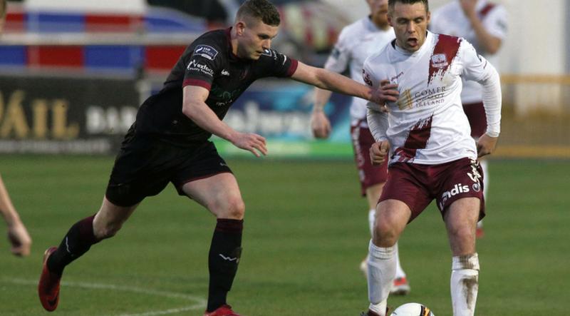 Galway United's Alan Murphy is challenged by Mark Slater of Wexford FC during Friday night's First Division tie at Eamonn Deacy Park. Photo: Joe O'Shaughnessy.