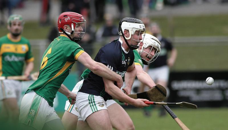 Adrian Morrissey of Liam Mellows comes under pressure from Craughwell's Adrian Cullinane and Matthew Freaney during Sunday's senior hurling championship tie at Kenny Park. Photo: Joe O'Shaughnessy.