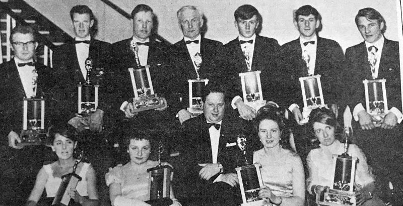 Mr. Michael O'Hehir, R.T.E. Sports Chief with the Galway Sports Stars of the Year after he presented them with their awards at the banquet in the Great Southern Hotel, Galway. Seated (l. to r.): Patricia Regan (Lawn Tennis), Katherine Small (Swimming); Mr. O'Hehir, Colette Heaney, who received it on behalf of her brother Frank for Boxing; Patricia Kelly (Table Tennis). Standing: Joehn Keenan (Gaelic Football), Mick Molloy (Athletics), Sean Hosty (Golf), Sean Duggan (Hall of Fame), Ciarán Keys (Soccer), Gerry O'Mahoney (Hurling) and Mick Glynn (Badminron).